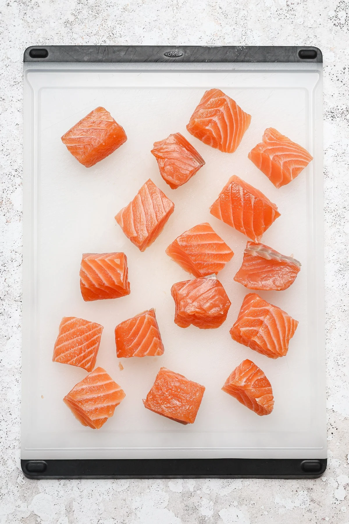 Salmon and shiitake threaded together on a skewer